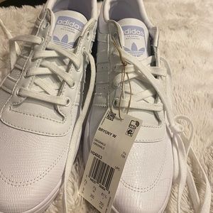 Adidas sneakers! White sneakers with purple accent colors:)